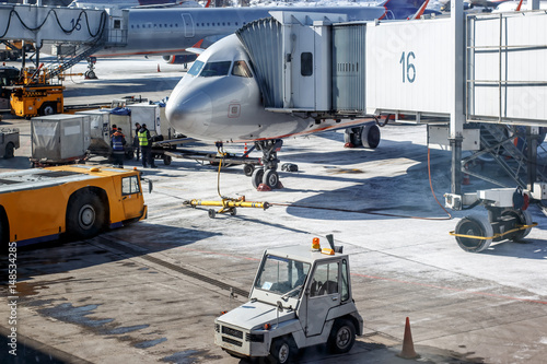 preparatory work near the plane at the airport © OLGA