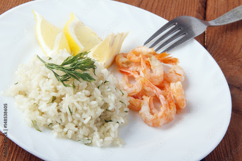Mediterranean dish of shrimps with rice. Dish of fresh, ecological clean products Mediterranean dish of shrimps with rice. Dish of fresh, ecological clean products
