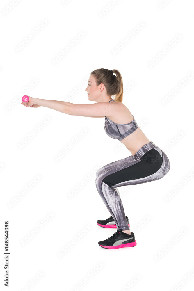 Young girl lifting weights Young girl lifting weights