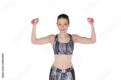 Young girl lifting weights