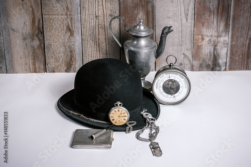 Bowlerhat and watch photo