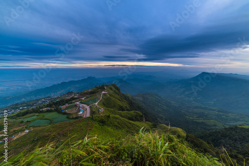 misty view point with mountain mist and fog road in phu tubberk most famous travel place in thailand photo