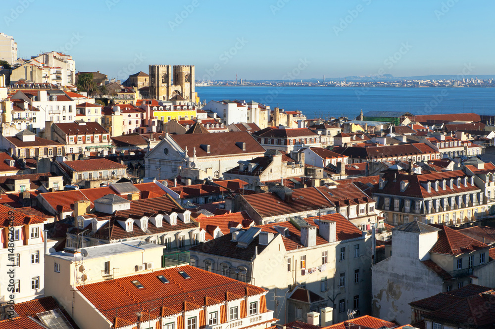View of the historic center of Lisbon, the cathedral of Santa Maria Maior de Lisboa (Sé de Lisboa) and the Tejo river