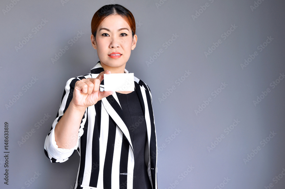 Asian business woman showing business card Asian business woman showing business card