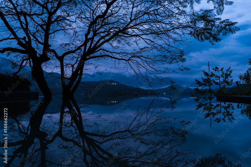 Tree reflection, Sun Moon Lake, Taiwan Tree reflection, Sun Moon Lake, Taiwan