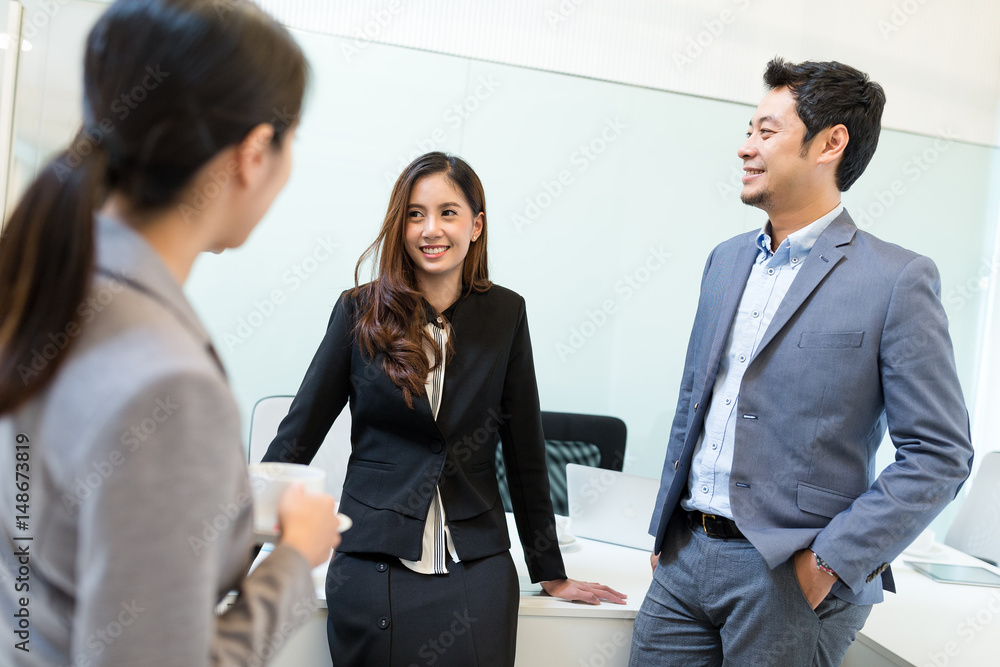 Business people discuss together in meeting room Business people discuss together in meeting room