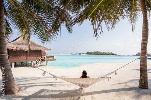 Relaxing view of Turquoise Waters in a Hammock