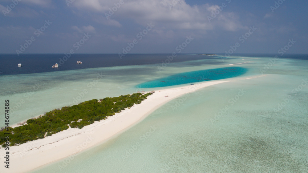 Aerial landscape of small island in Indian ocean, Maldives Aerial landscape of small island in Indian ocean, Maldives