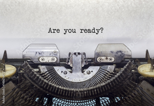 Vintage typewriter on white background with text Are you ready?