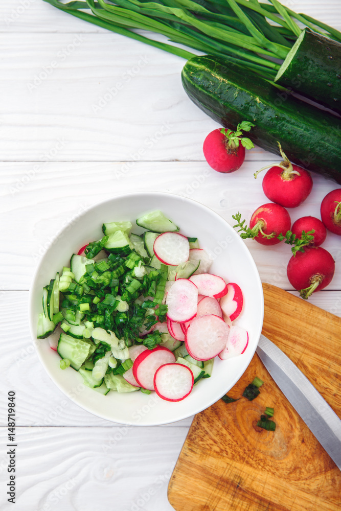 Cucumber salad, radish and green onions Cucumber salad, radish and green onions