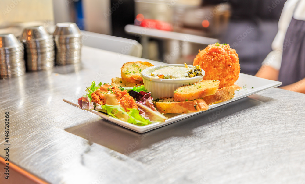 Sampler Entree Cook to Order Sampler Entree served for pickup at a