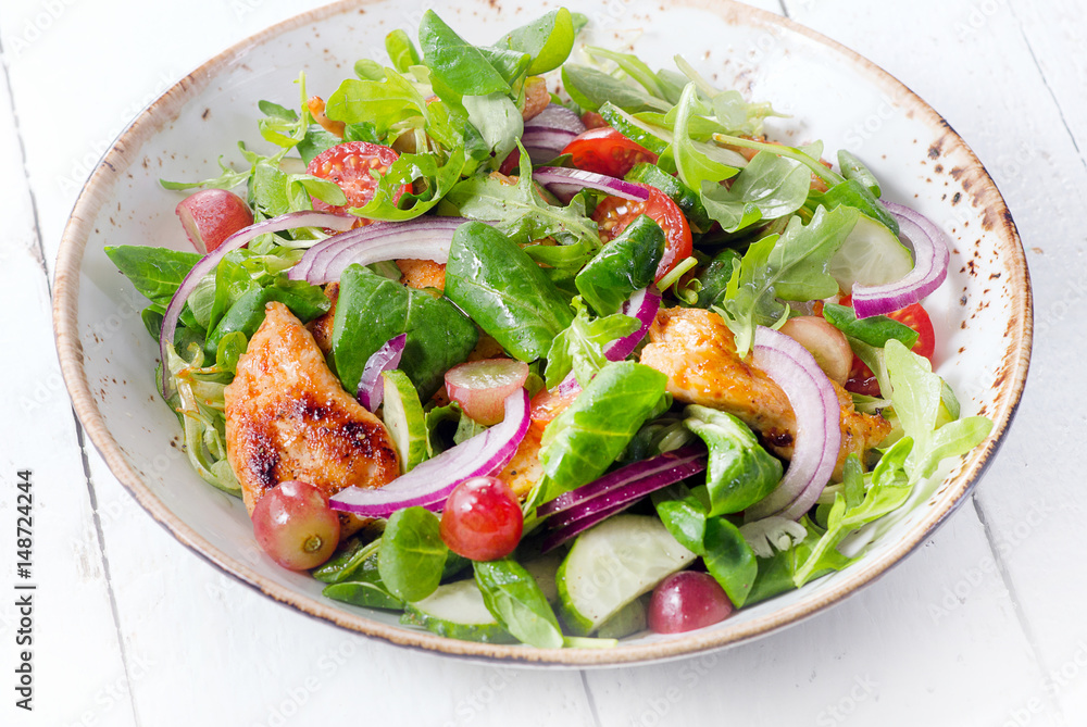 Fresh salad with chicken and vegetables. Fresh salad with chicken and vegetables.