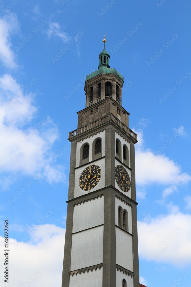 Perlach tower in front of blue sky with white clouds, Augsburg, Germany