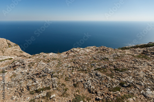 Canvas Print Mountain ledge with sea and horizon on background for product placement