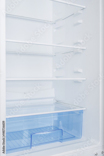 White refrigerator isolated on white background