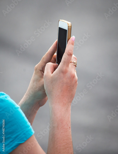 Girl with a cell phone in her hand