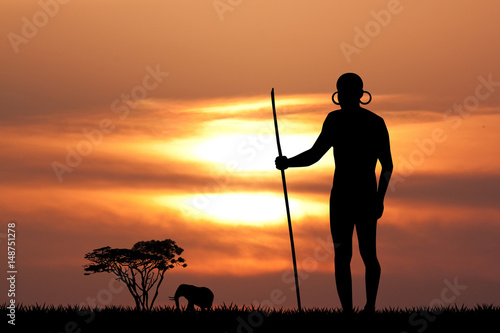 Masai man silhouette at sunset