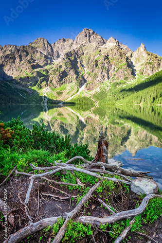 Fototapeta Naklejka Na Ścianę i Meble -  Wonderful sunrise at lake in the Tatra Mountains, Poland, Europe