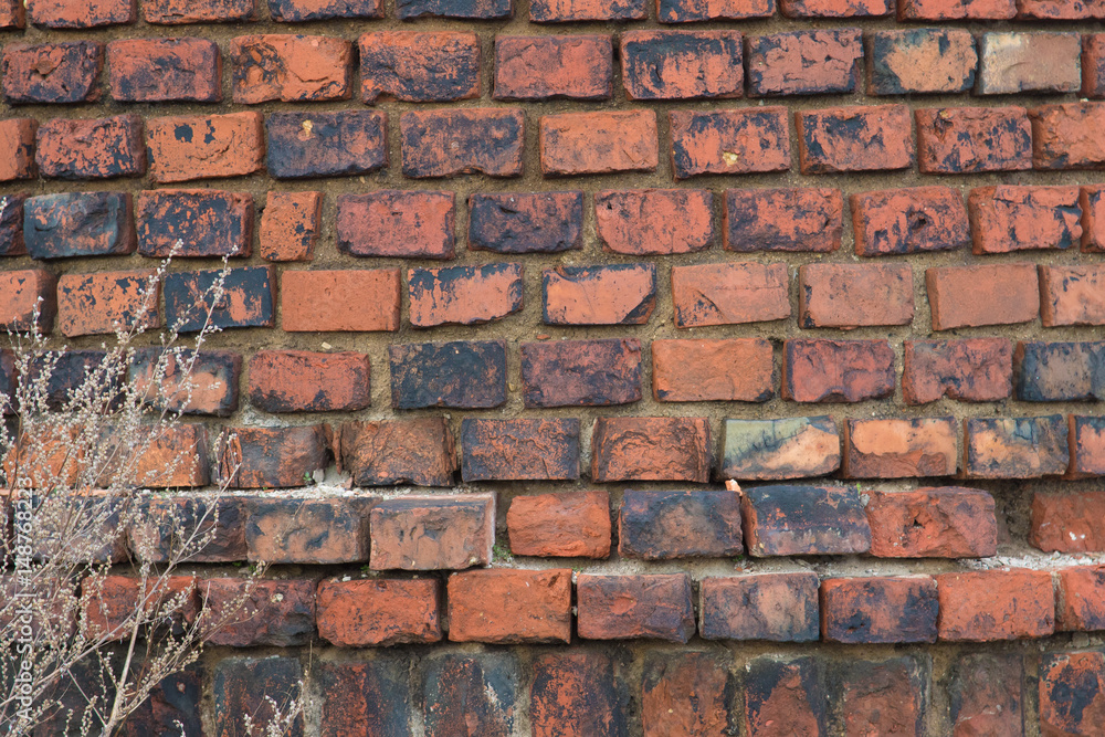 Background texture of an old ruined brick wall Background texture of an old ruined brick wall