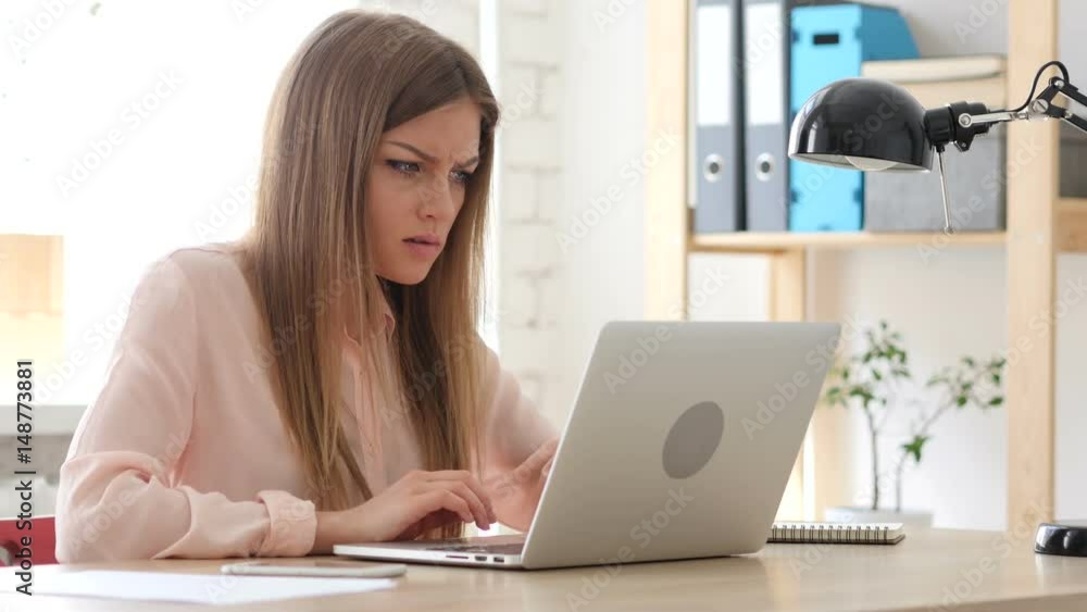 Angry Creative Woman Working on Laptop Angry Creative Woman Working on Laptop