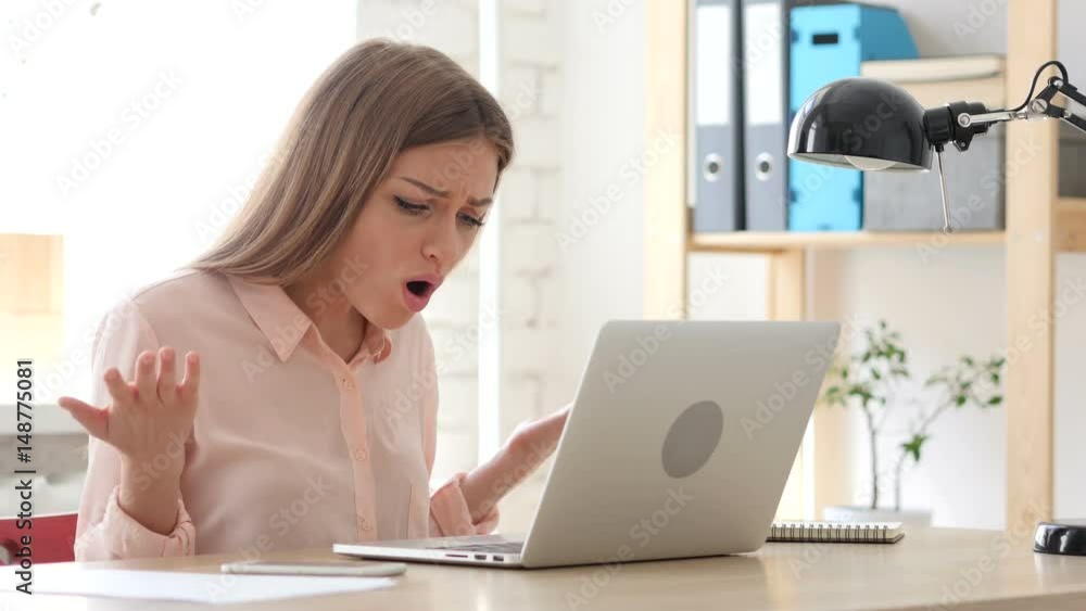 Woman Reacting to Loss, Working on Laptop Woman Reacting to Loss, Working on Laptop
