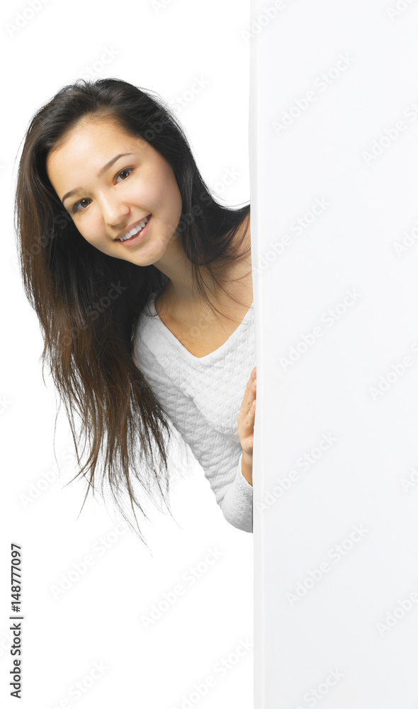 Woman smiling showing white blank sign billboard Woman smiling showing white blank sign billboard