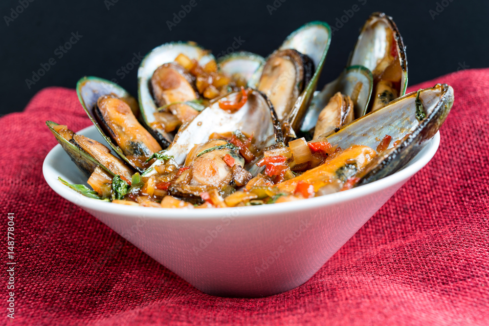 Mussel with white wine sauce on table Mussel with white wine sauce on table