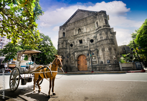 Horse Drawn Carriage parking in front of Malate church , Manila Philippines.