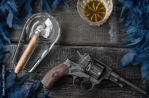 Guns, whiskey and cigar