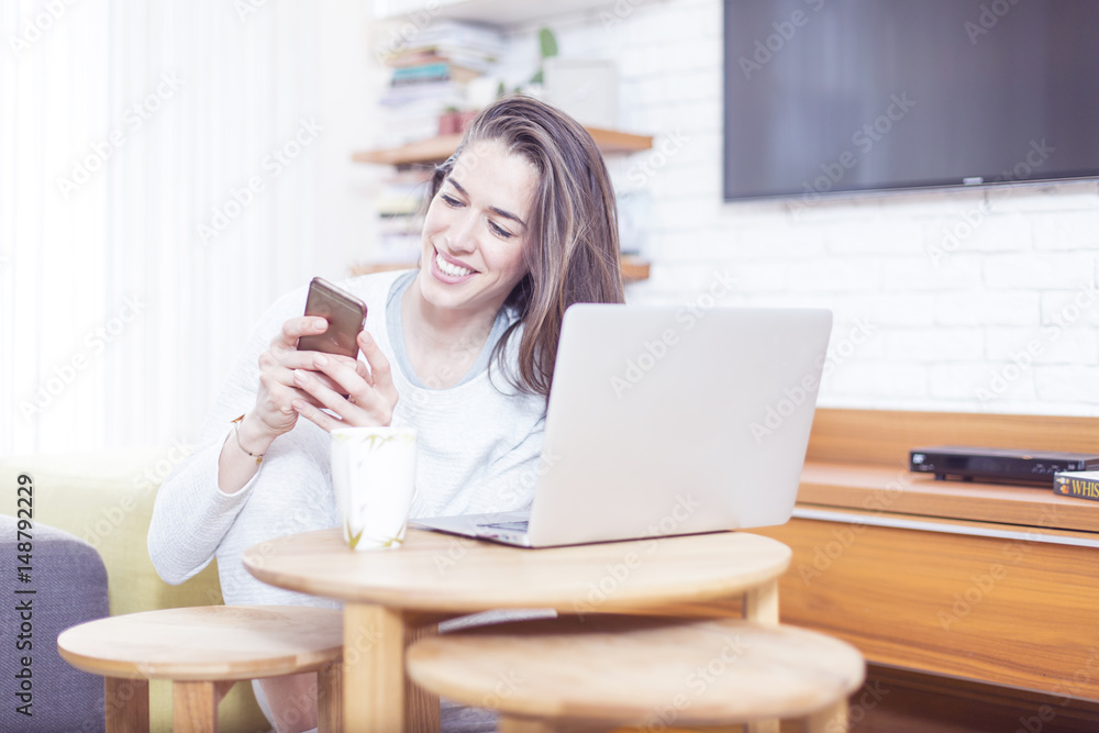 Morning scene. Beautiful woman using laptop at home Morning scene. Beautiful woman using laptop at home