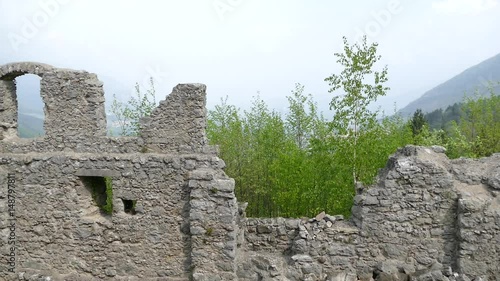 
landscape around castle ruin castel belfort in italy photo