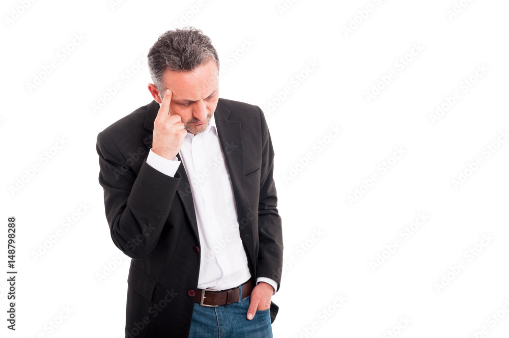Successful man thinking or contemplating at something Successful man thinking or contemplating at something