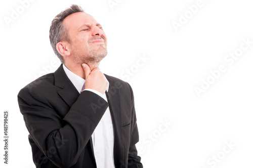 Young man with throat pain or tonsillitis © Catalin Pop