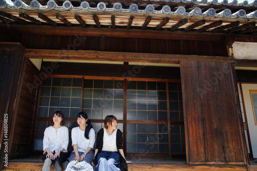young attractive asian women in japanese veranda