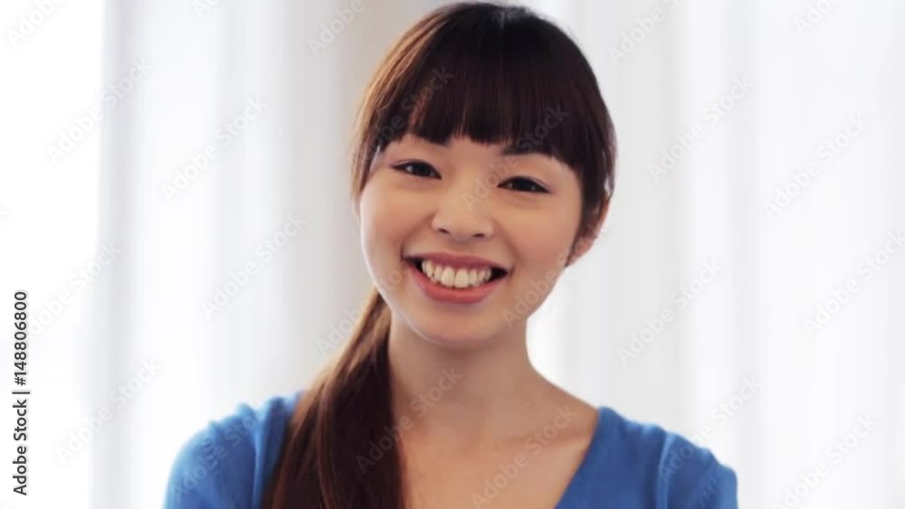 happy smiling asian young woman happy smiling asian young woman