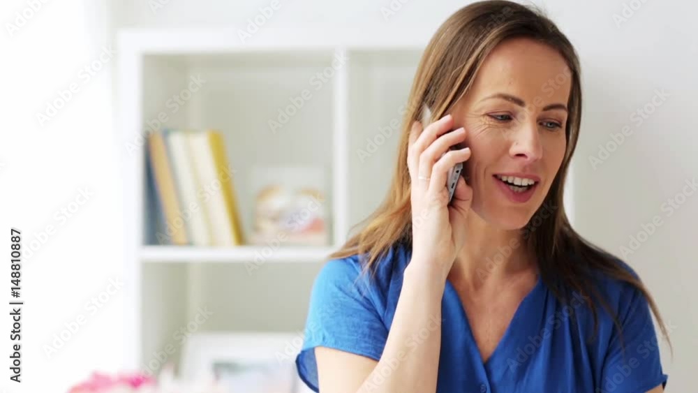 woman calling on smartphone at office or home woman calling on smartphone at office or home