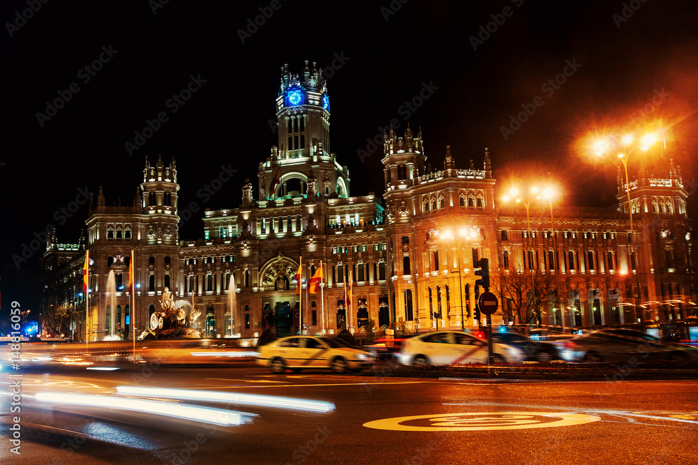 Cybele Palace at the Plaza de Cibeles at night in Madrid, Spain