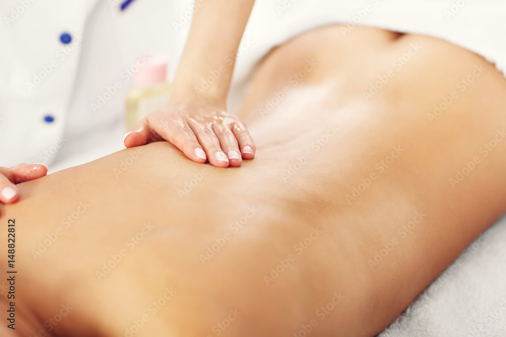 Beautiful woman getting massage in spa Beautiful woman getting massage in spa