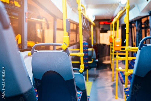 Modern city bus interior and seats photo