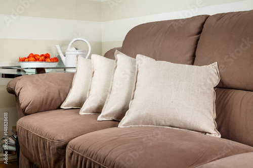 pillows spread out on the sofa