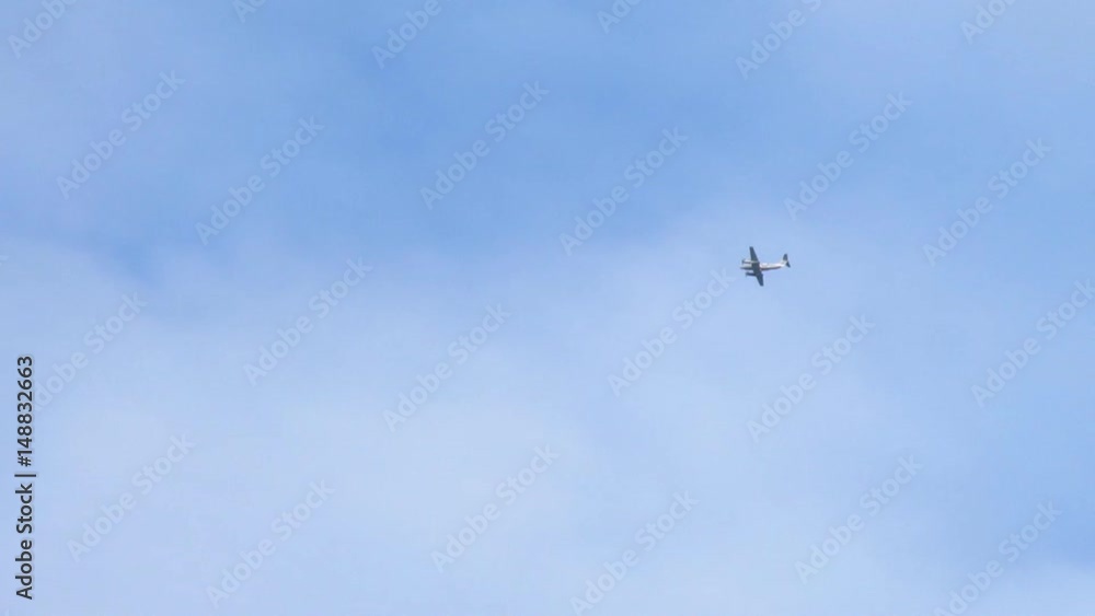 airplane flying through clouds airplane flying through clouds
