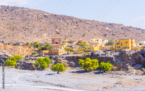 View of a village next to the Riwaygh as-Safil ruins in Oman. photo