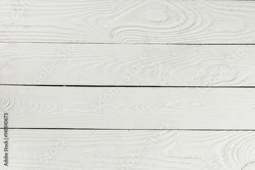 Close-up view of white textured wooden background from wooden planks