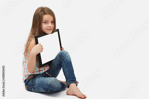 Cute girl holding a blank sign