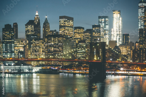 Brooklyn Bridge and Manhattan by Night - New York