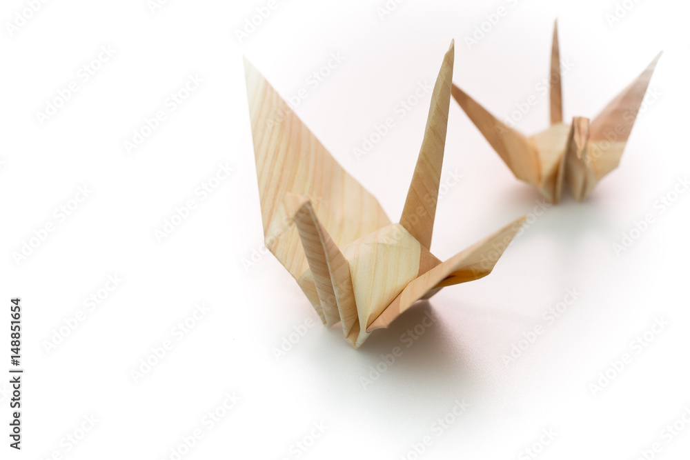 Japanese origami - Two paper cranes in wood grain paper
Japanese origami - Two paper cranes in wood grain paper