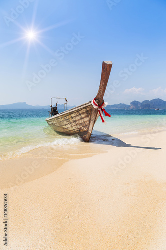 longtail boat in andaman sea with blue sky at krabi Thailand