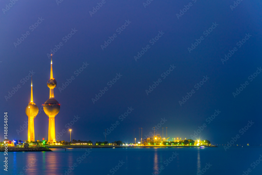 Φωτογραφία View of the illuminated Kuwait Towers - the best known landmark of Kuwait City - during night