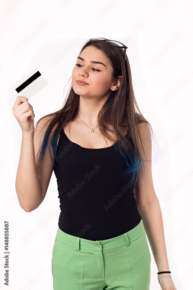 a young business woman holding new credit card a young business woman holding new credit card