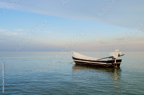 fishing boat on the sea with blue sky